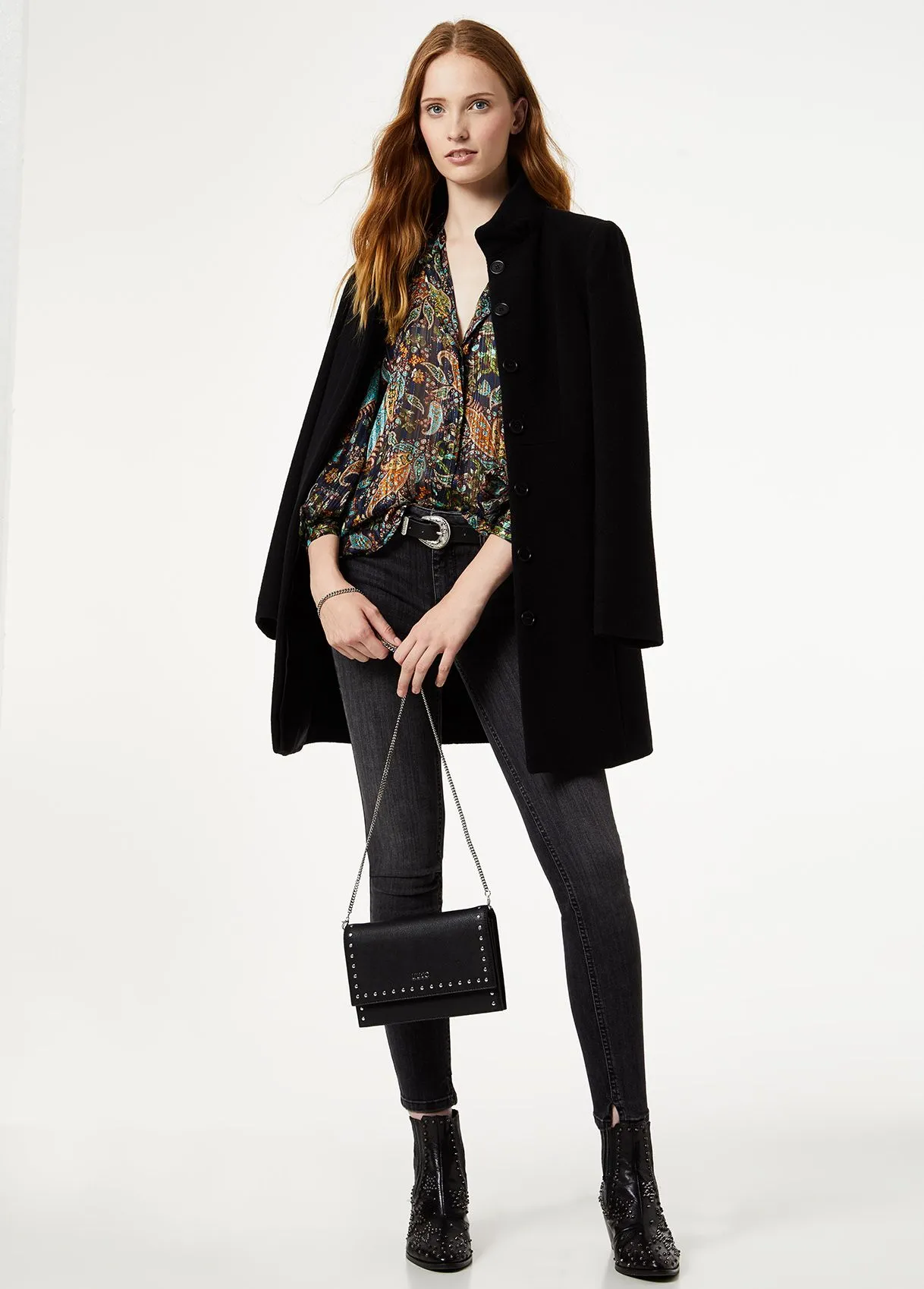 Cappotto con castoni gioiello