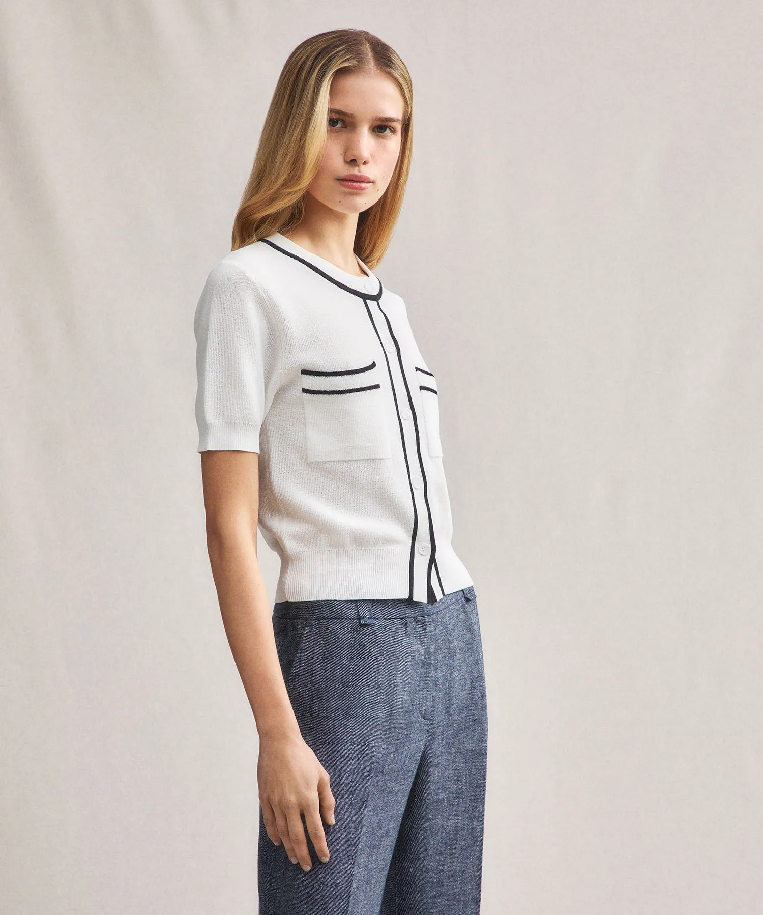 Cardigan manica corta con tasche al petto