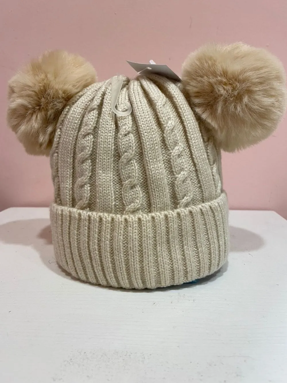Cuffia treccia due ponpon