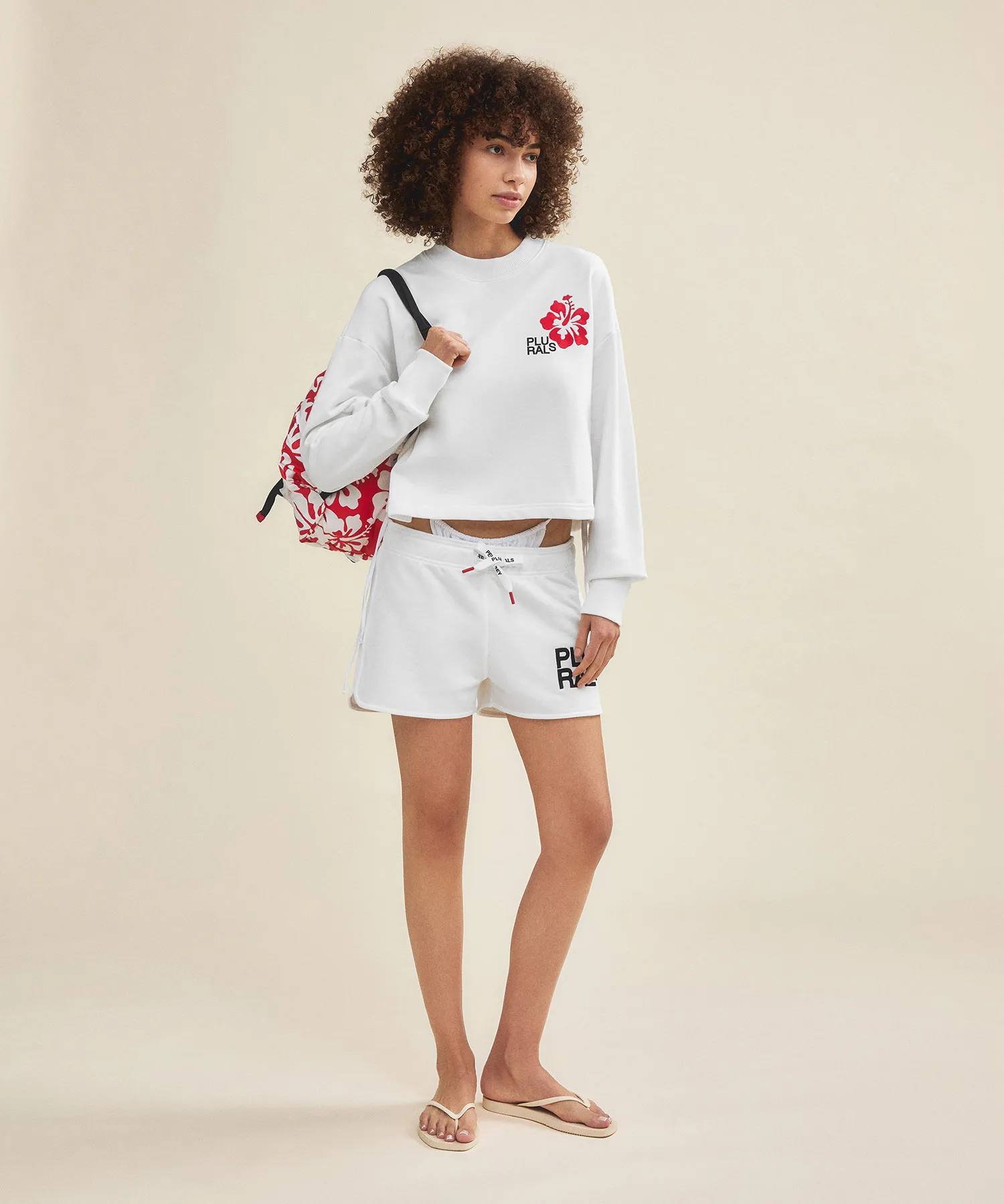Felpa cropped con ricamo al petto