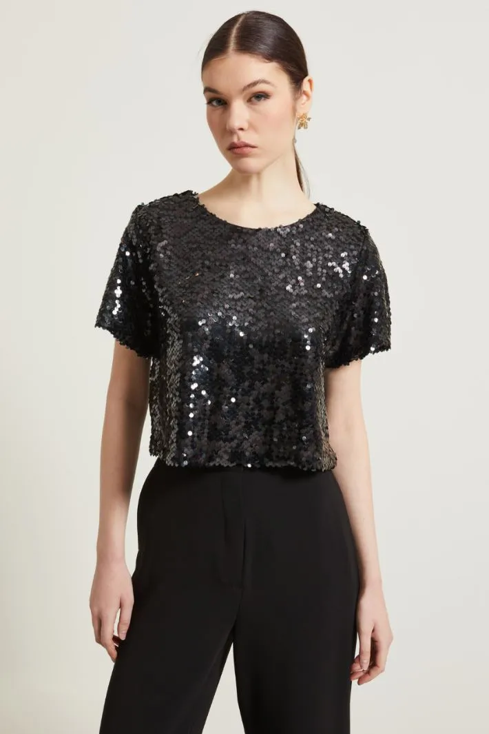 Top corto con paillettes