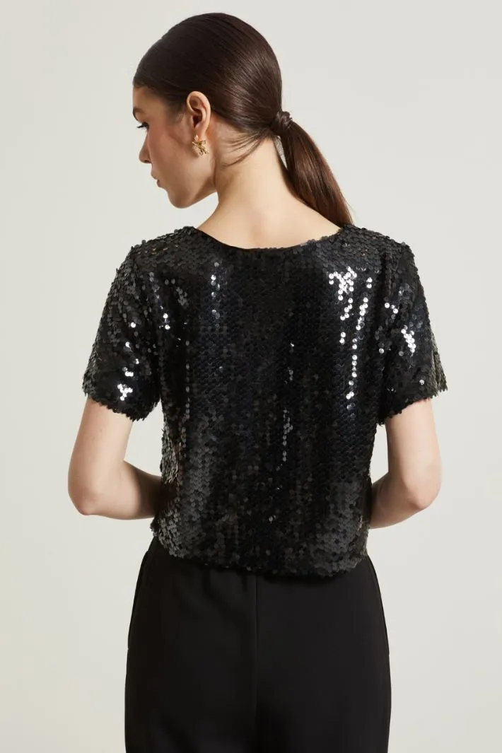 Top corto con paillettes